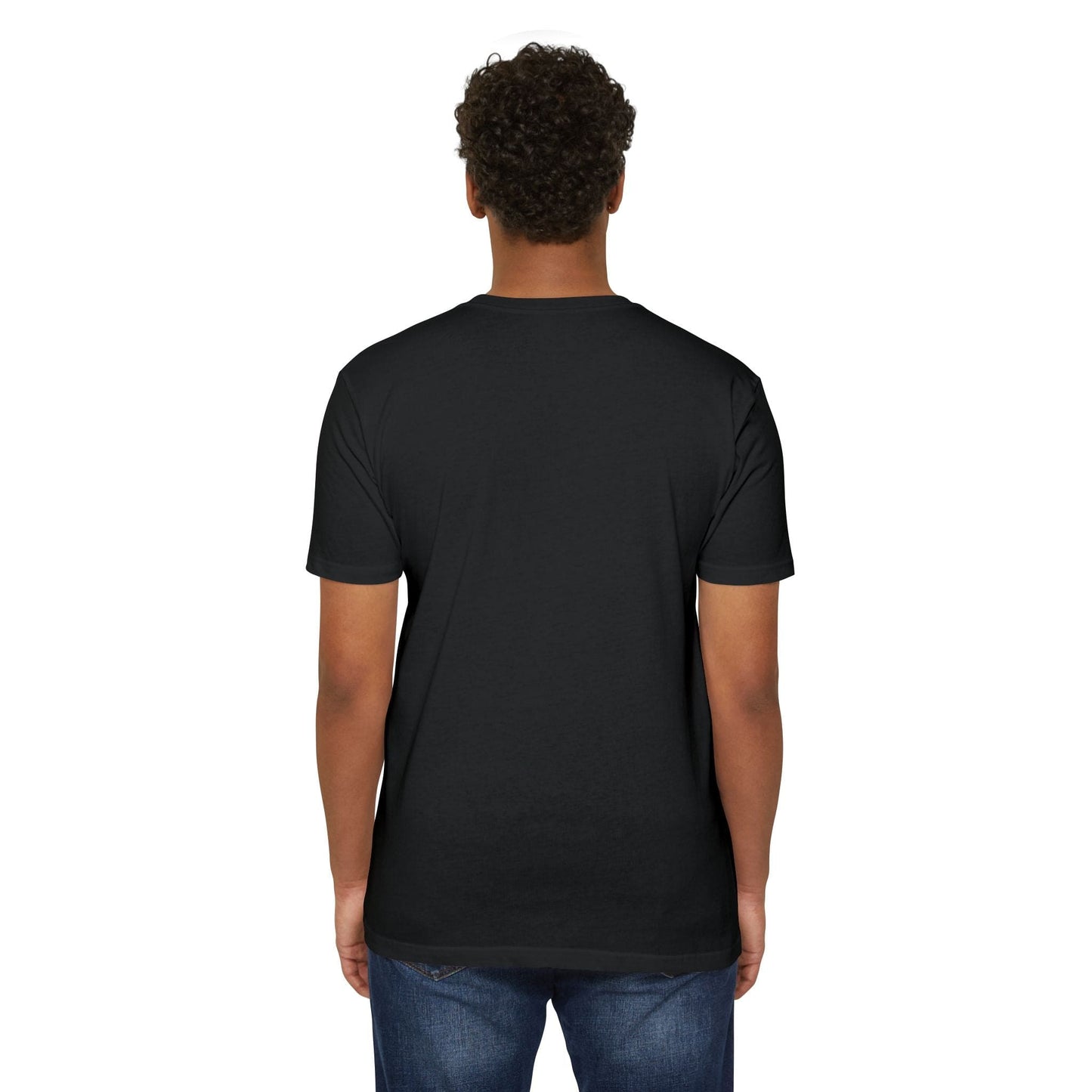 A person with curly hair is standing and facing away from the camera, wearing a black Unisex T-shirt Skeleton Bat Last F*ck Design and blue jeans against a white background.