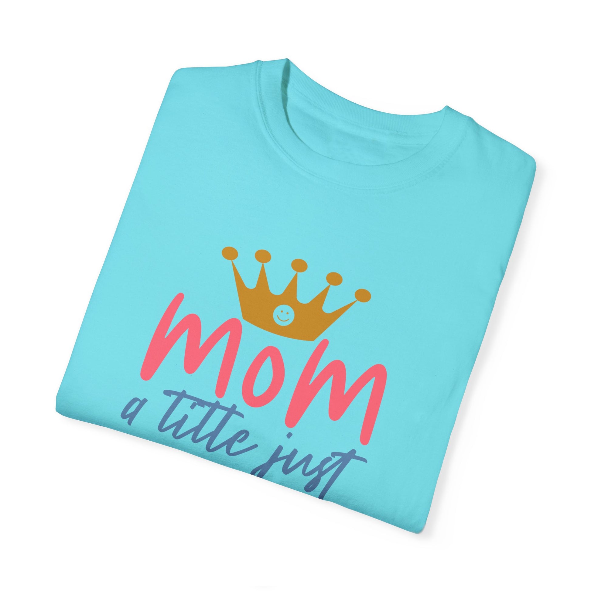 This Stylish Comfort unisex Comfort Colors 1717 garment-dyed T-shirt in blue, crafted from soft ring-spun cotton, showcases a crown graphic and the phrase: "Mom, a title just above queen.