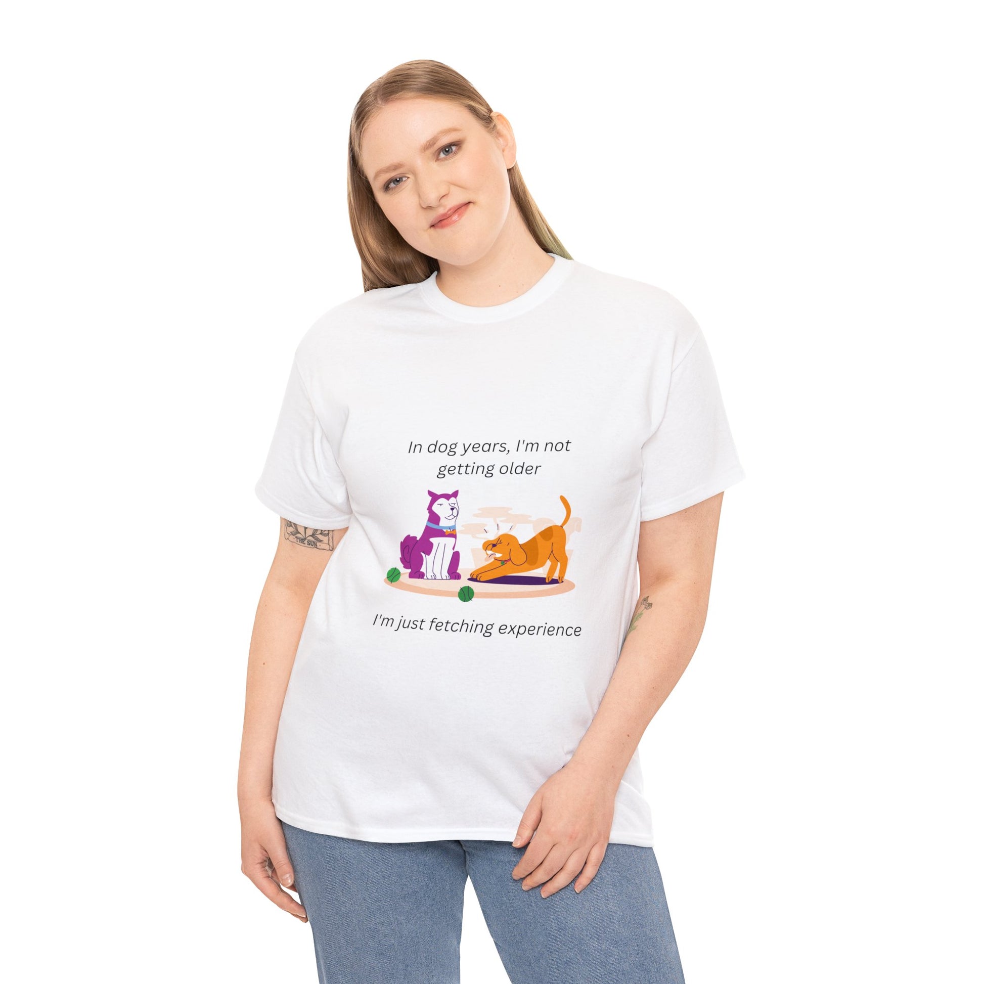 A  white shirt that says "I'm not getting old; in dog years I'm fetching experience." With a silly cartoon of two dogs. One serious, the other playful