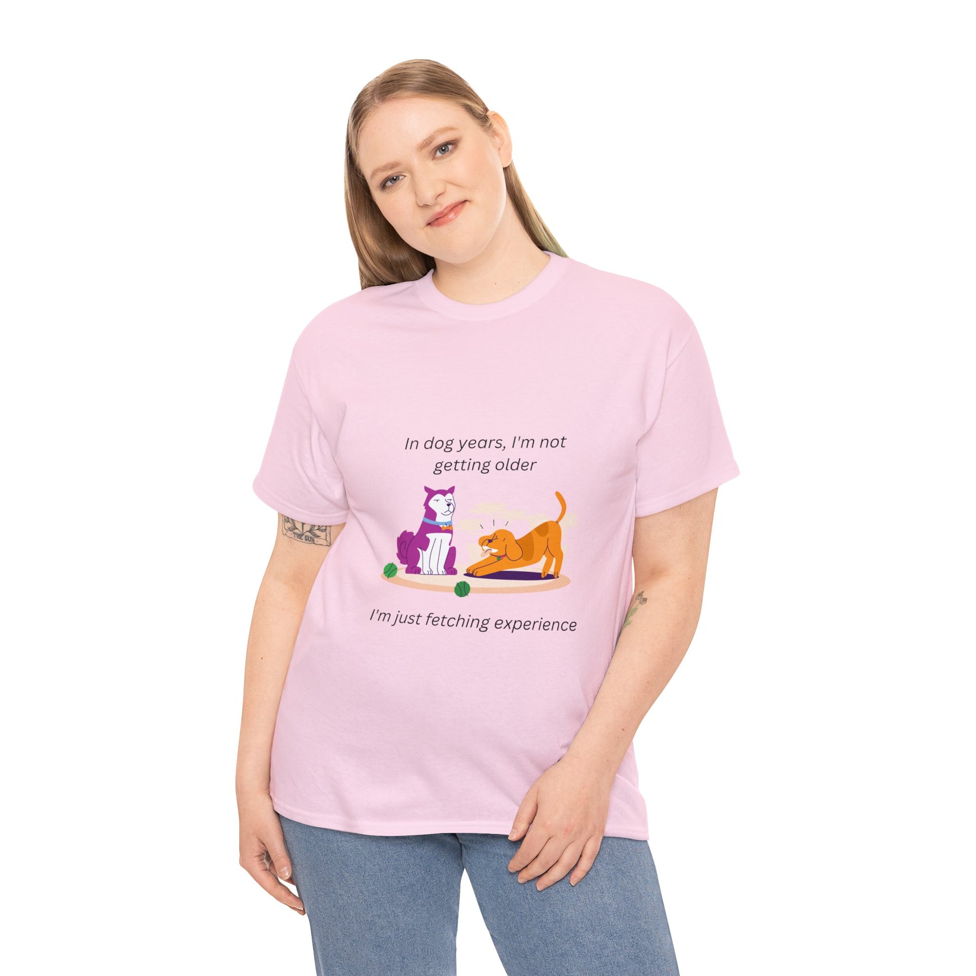 A  pink shirt that says "I'm not getting old; in dog years I'm fetching experience." With a silly cartoon of two dogs. One serious, the other playful