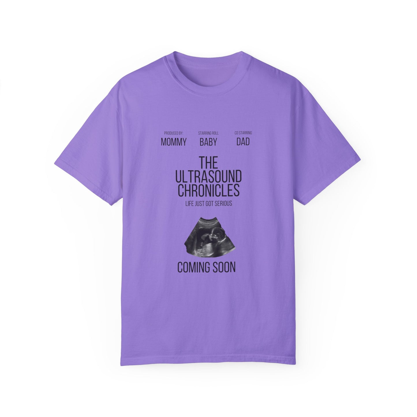 This purple shirt, made from the cozy Comfort Colors 1717 ring-spun cotton, showcases the text "The Ultrasound Chronicles: Life Just Got Serious" alongside an ultrasound image and credits for "Mommy," "Baby," and "Dad." It is as charming as it is comfortable.