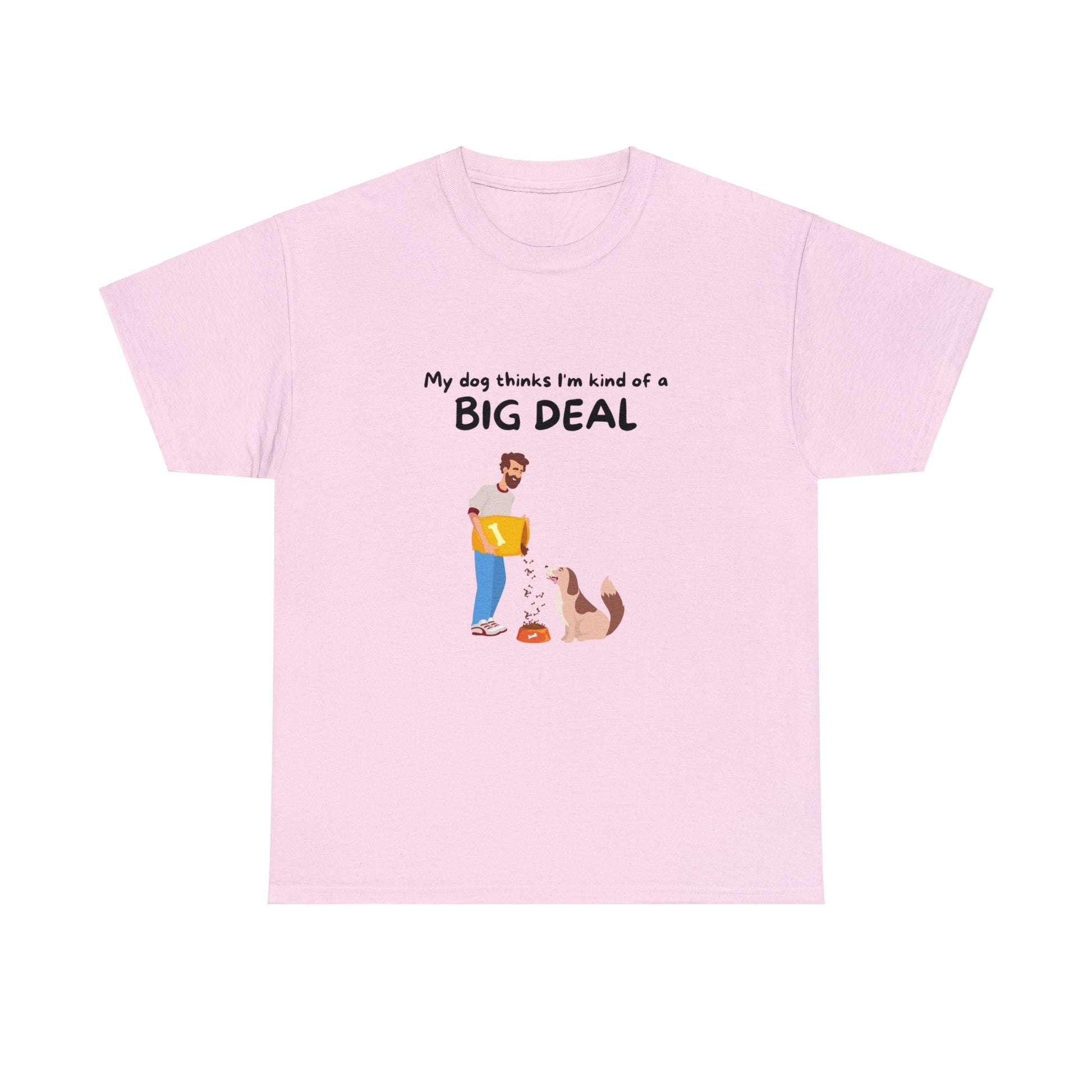 The Unisex Heavy Cotton Tee - MY DOG THINKS I'M A BIG DEAL offers a seamless design in pink, showcasing a cartoon of a person feeding a dog and the text "My dog thinks I'm kind of a BIG DEAL." This sustainable shirt is perfect for any dog lover looking to add charm to their casual wardrobe.