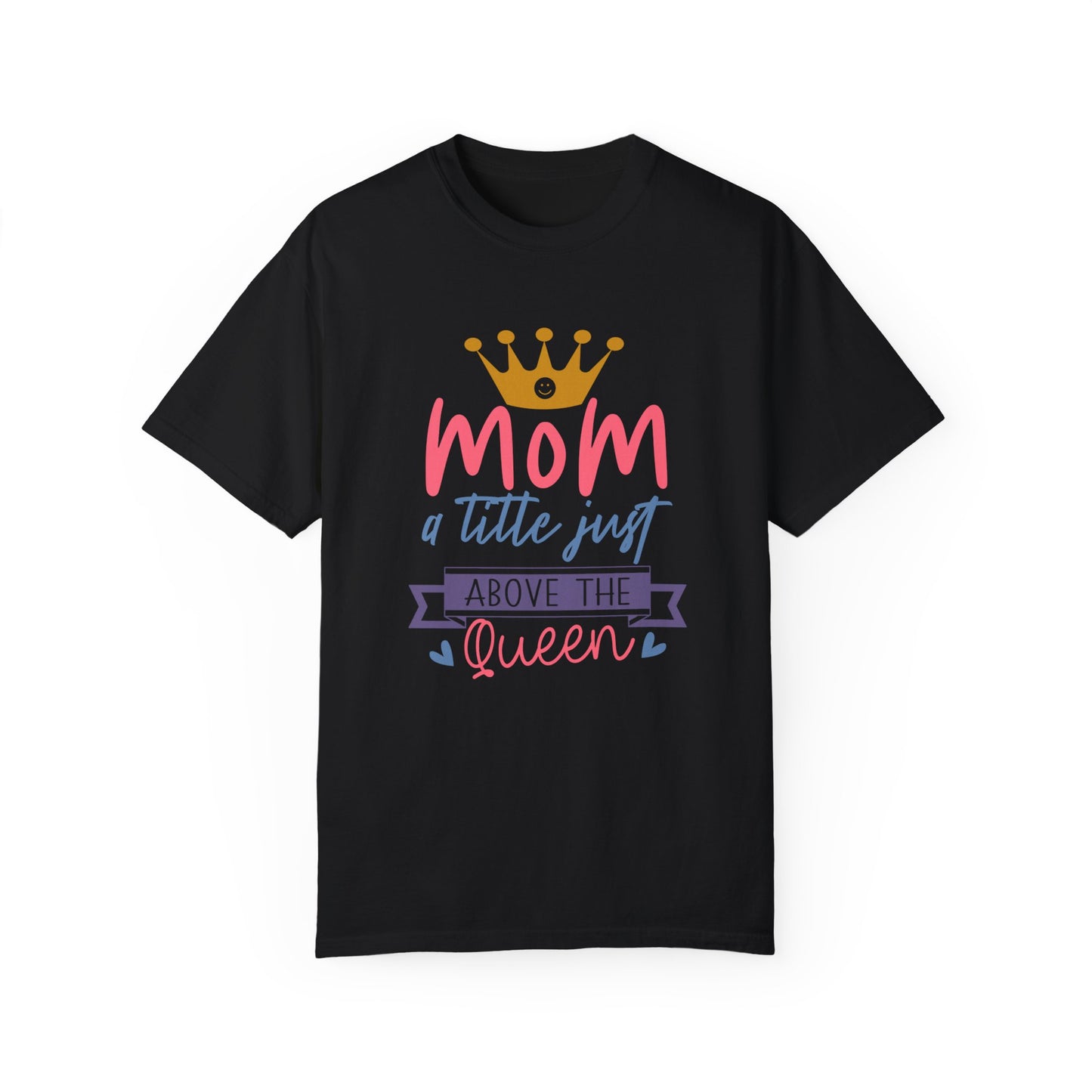 Unisex Comfort Colors 1717 Garment-Dyed T-Shirt in stylish black, designed with soft ring-spun cotton featuring the phrase "Mom, a title just above the Queen" in lively pink, orange, and purple colors. Enhanced with a crown graphic for added charm, this t-shirt provides comfort on par with other Comfort Colors 1717 garment-dyed options.