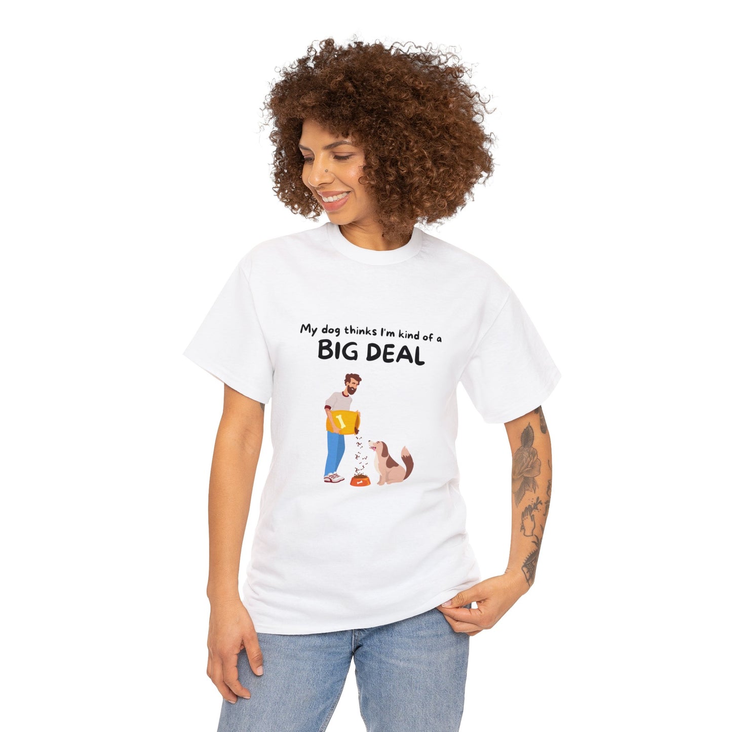 Individual donning a Unisex Heavy Cotton Tee adorned with an illustration of a person and their dog, alongside the phrase "My dog thinks I'm kind of a big deal." An ideal choice for passionate dog enthusiasts who value impeccable design.