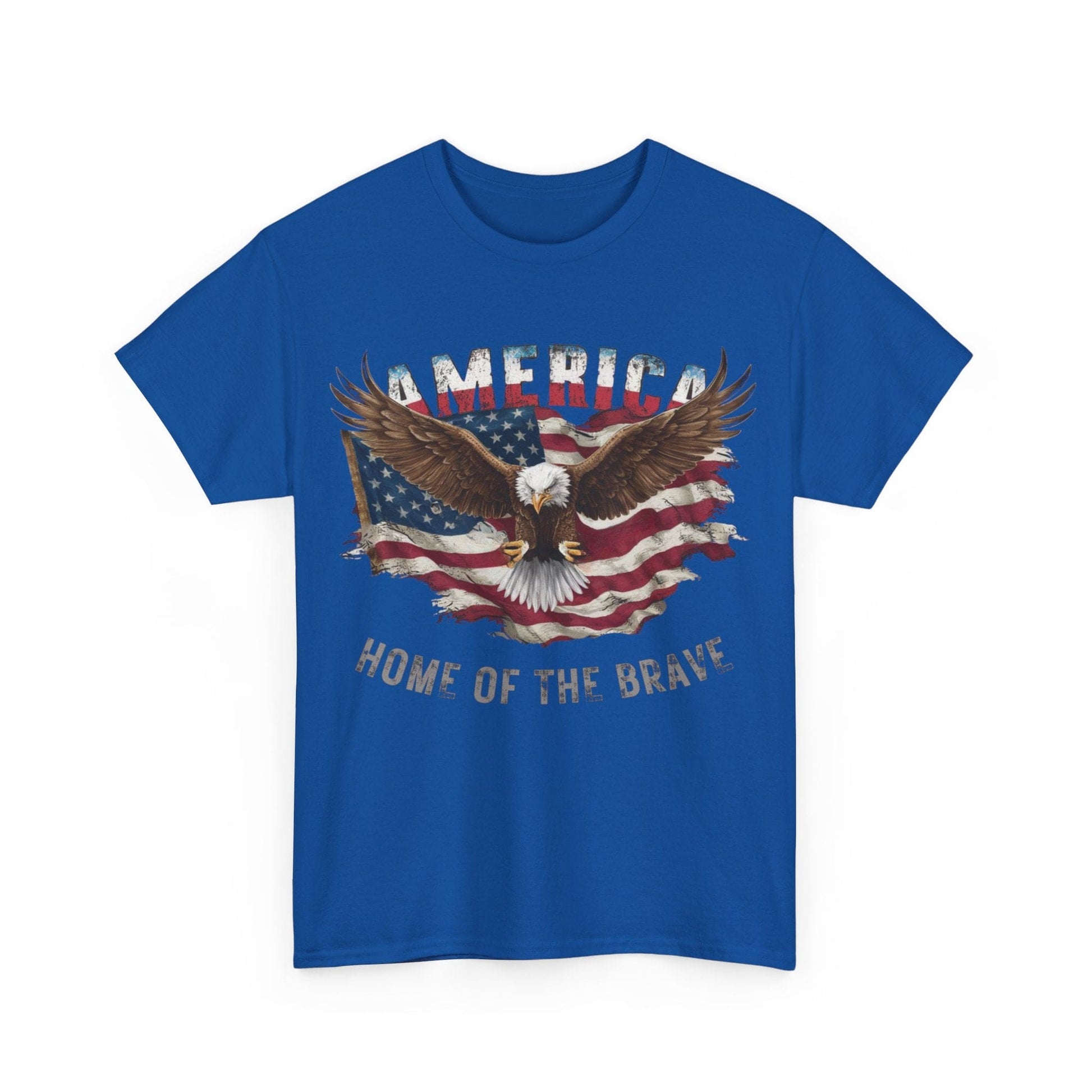 The Unisex Heavy Cotton Tee in blue is made from US cotton and showcases a powerful image of a bald eagle set against the American flag, accompanied by the phrase "HOME OF THE BRAVE.