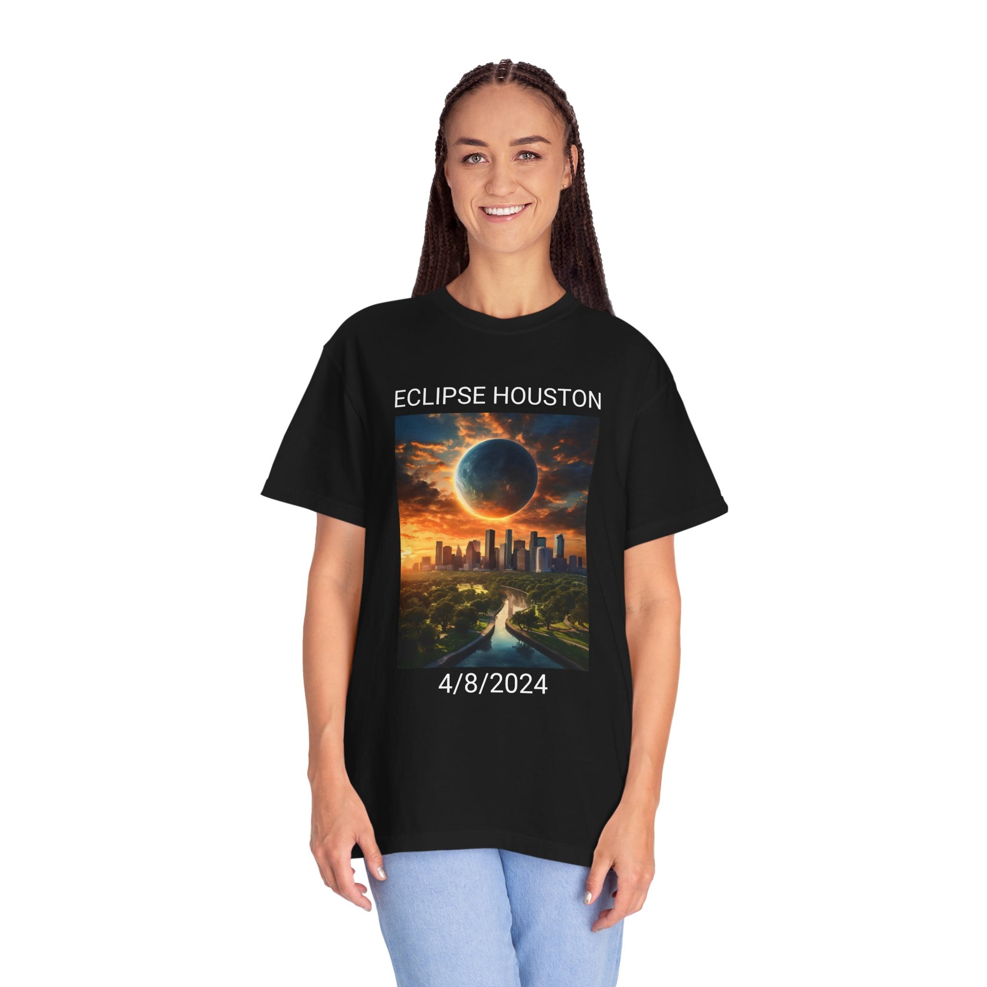 A person dressed in a "Stylish Comfort with Unisex Comfort Colors 1717 Garment-Dyed T-Shirt - Eclipse Houston 2024," showcasing a city skyline and solar eclipse graphic along with the text "Eclipse Houston" and "4/8/2024.