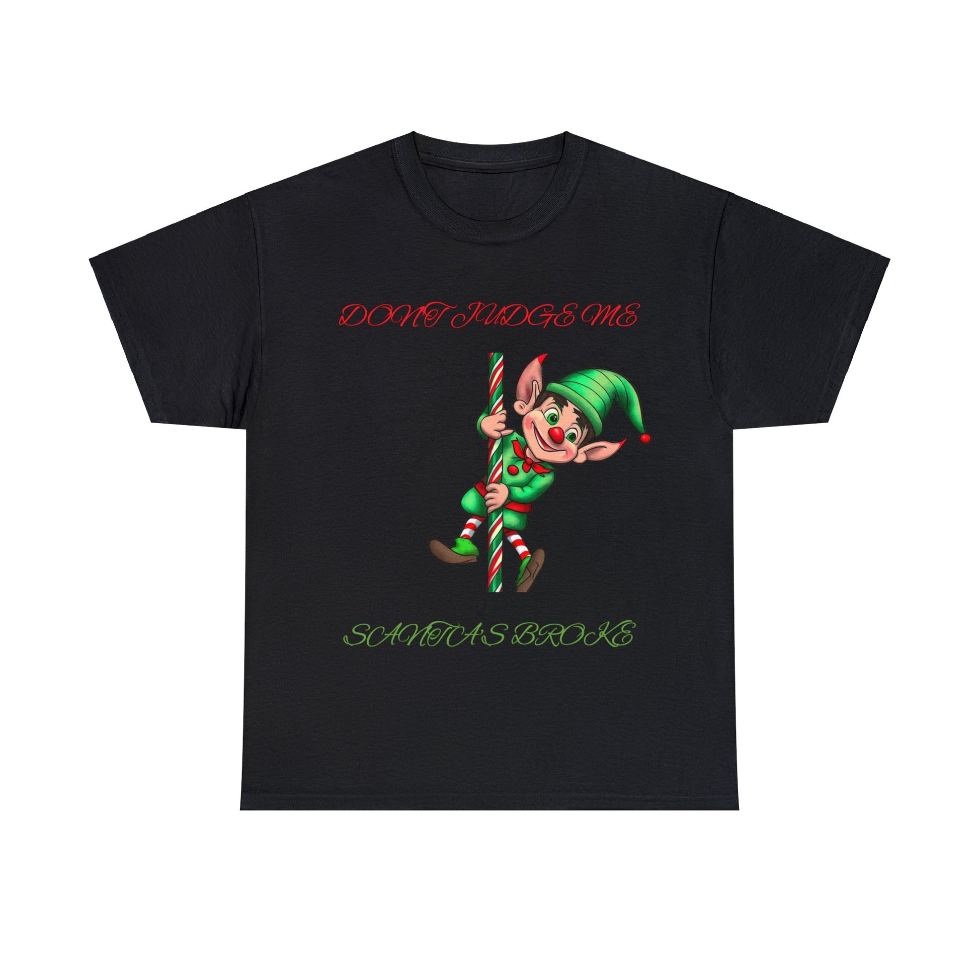 The Unisex Heavy Cotton- Don't Judge Me Elf features a black T-shirt in a classic fit, showcasing a cartoon elf holding a candy cane. It includes the text "DON'T JUDGE ME" in red and "SANTA'S BROKE" in green, crafted from 100% sustainable cotton for enhanced comfort and style.