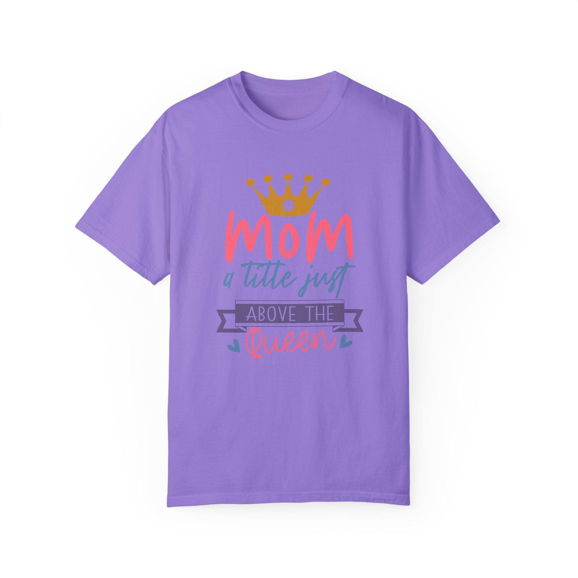 The Stylish Comfort with Unisex Comfort Colors 1717 Garment-Dyed T-Shirt in purple, made from soft ring-spun cotton, showcases the text "mom just a little above queen" accompanied by a yellow crown graphic.