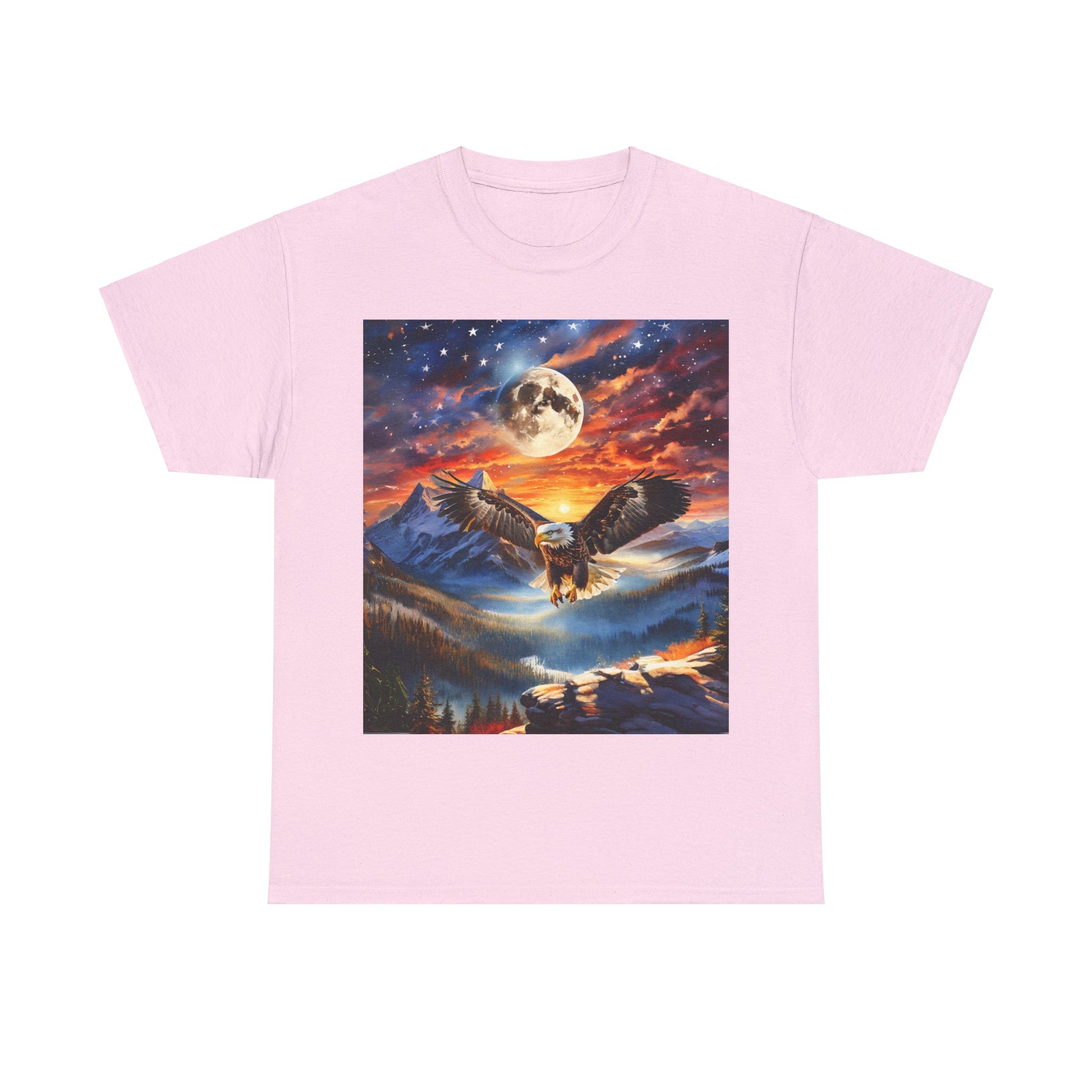 Unisex Heavy Cotton Tee - Stars, Stripes, and Soaring Spirit: A Bald Eagle's Tribute with a graphic of an owl flying over mountains against a moonlit sky, featuring a glowing full moon and colorful clouds. This classic fit piece is crafted from sustainably sourced cotton for ultimate comfort and style.