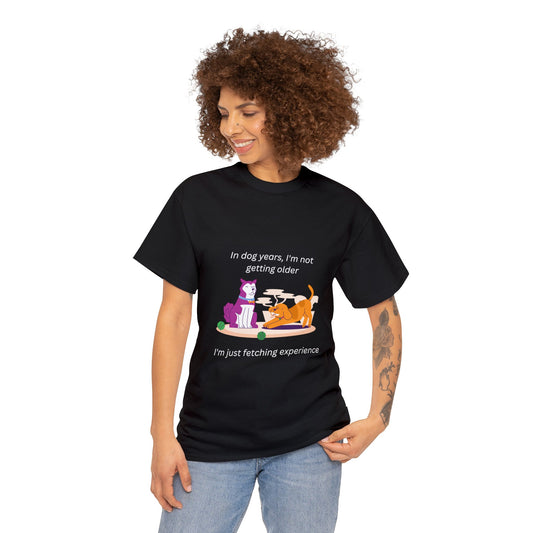 black tee shirt that says 'I'm not getting old; in dog years I'm fetching experience.' With a silly cartoon of two dogs. One serious, the other playful