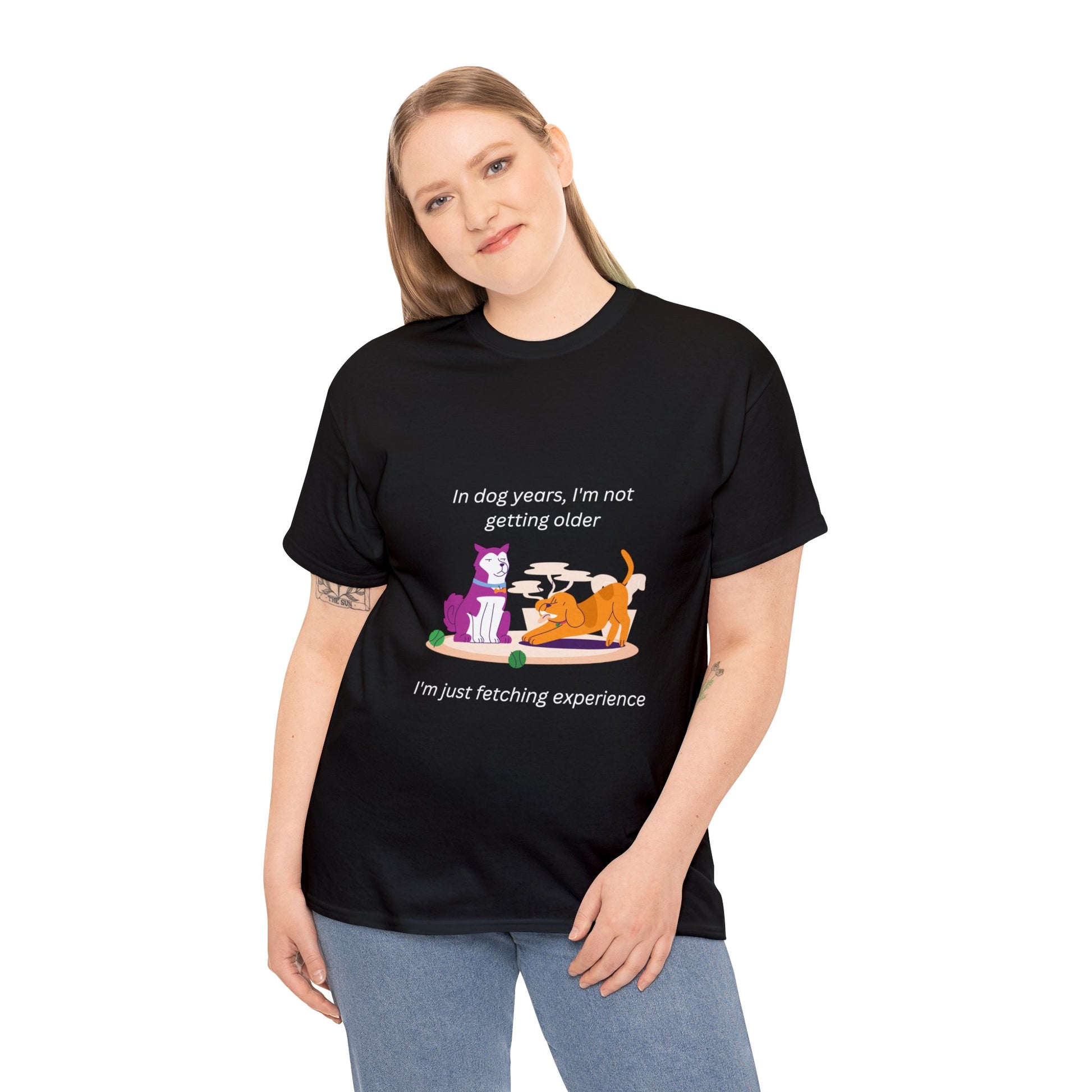 A  black shirt that says "I'm not getting old; in dog years I'm fetching experience." With a silly cartoon of two dogs. One serious, the other playful