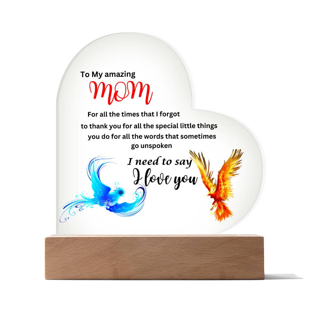 A heart shaped "To my amazing mom I need to say i love you phoenix" plaque featuring an image of a bird and a heart, perfect for Mom as a gift.