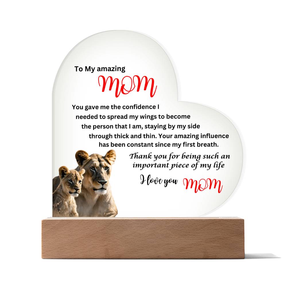 A To my amazing mom lions acrylic heart plaque with wooden base, perfect for mom as a gift.