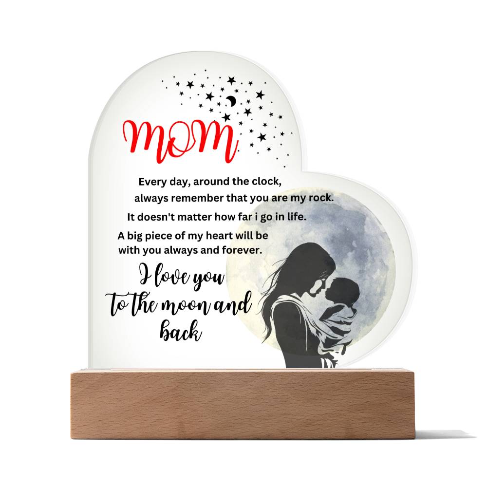 A Mom, you are my rock, i love you to the moon acrylic heart plaque with a wooden base makes a perfect gift.