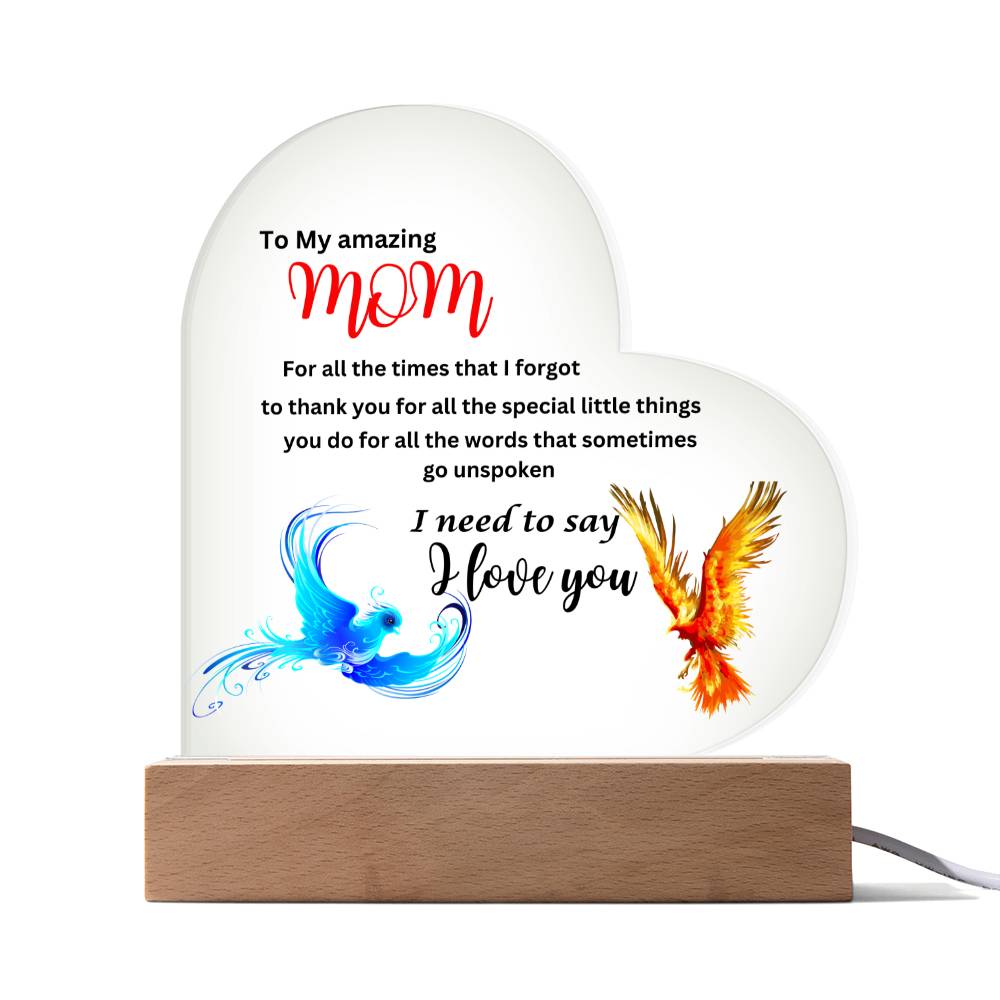 A heart-shaped To my amazing mom I need to say i love you phoenix acrylic plaque with wooden base - a perfect gift for Mother's Day.