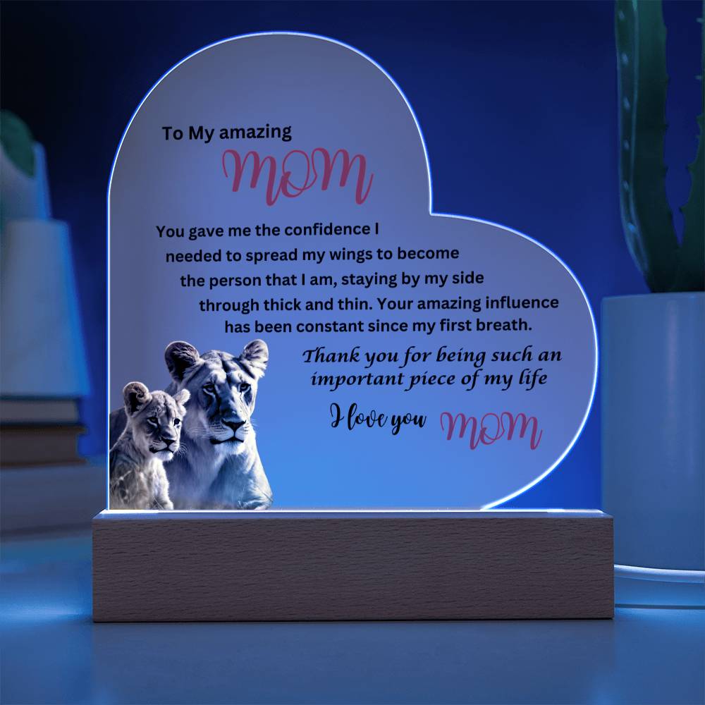 A To my amazing mom lions acrylic heart plaque with wooden base makes for a unique gift.