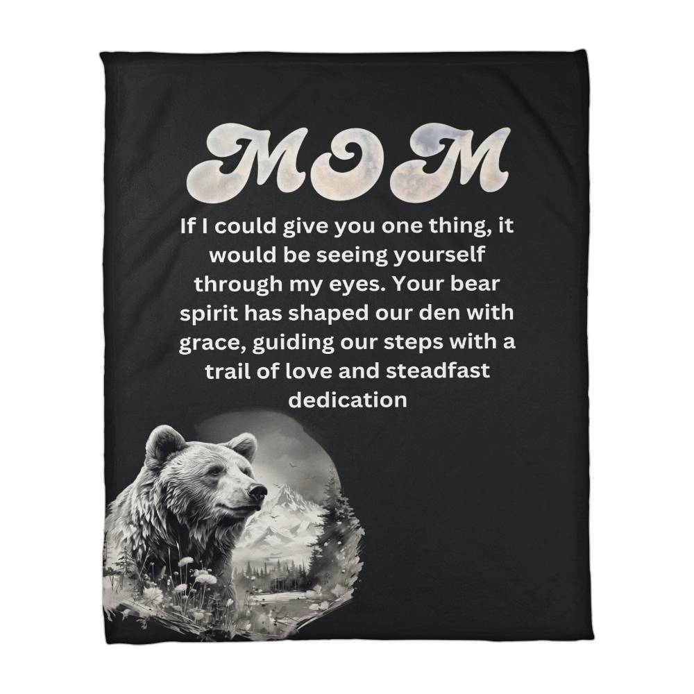 A Mothers Day Coral Fleece Blanket- Guardian of Love: Embracing Mom's Bear Spirit with a design featuring the word "mom" and a heartfelt message, alongside an image of a bear in a forest scene.