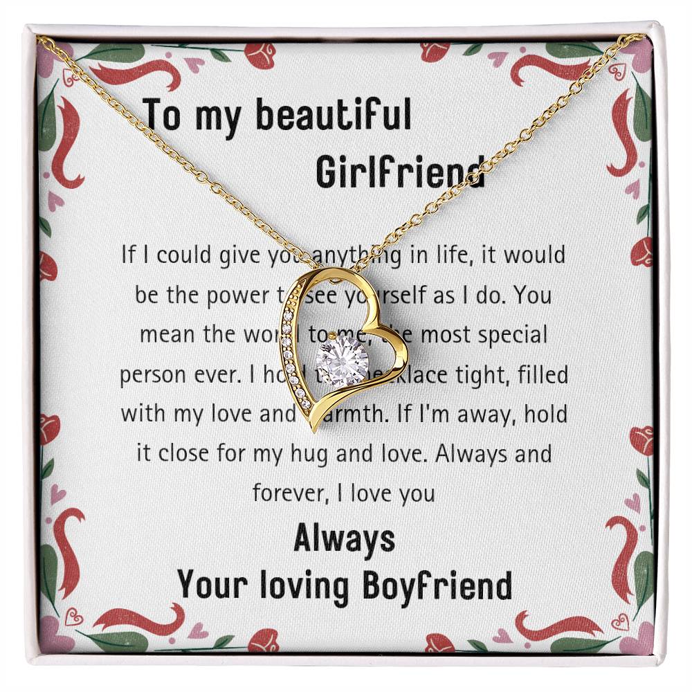 Forever Love Necklace: A gold-finished heart necklace featuring a shimmering cubic zirconia pendant, elegantly displayed alongside a heartfelt message to express eternal love and devotion to your girlfriend.